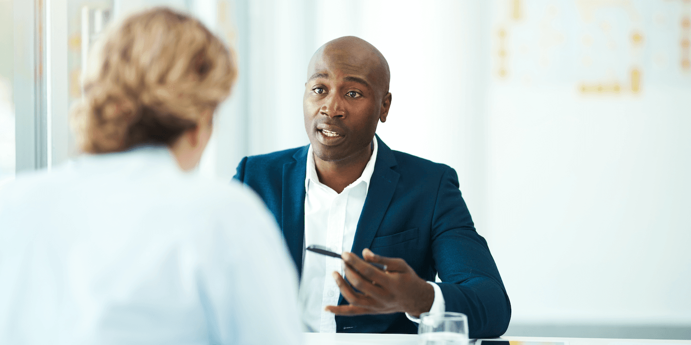 person answering a question during a job interview
