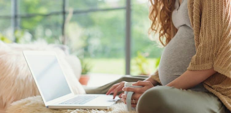 person pregnant working from home