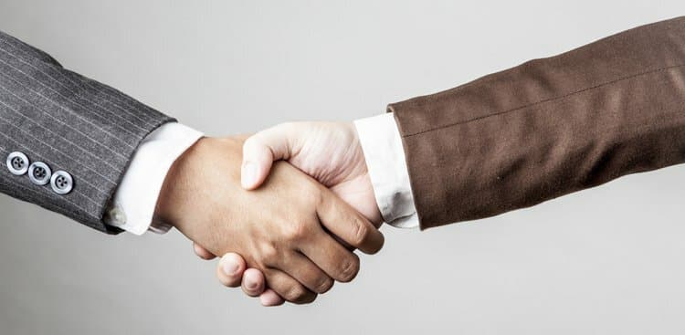 people shaking hands