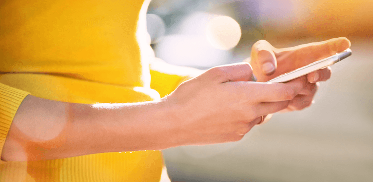 person using a smartphone outside