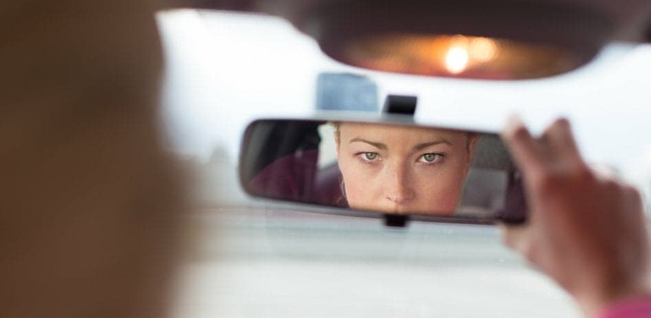 person looking in mirror