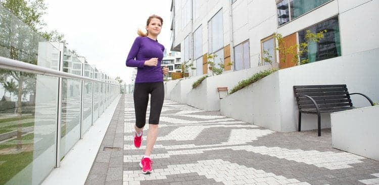 woman running outside office