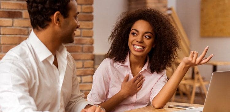 co-workers talking about a project