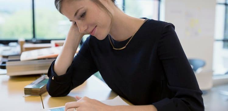 person looking at phone courtesy Hero Images/Getty Images