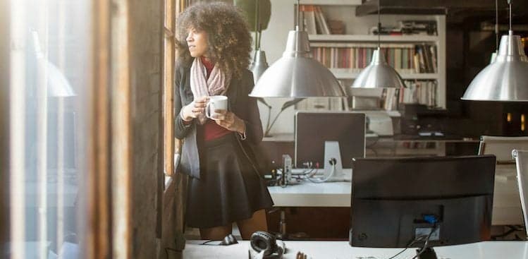woman looking thoughtful courtesy xavierarnau/Getty Images.
