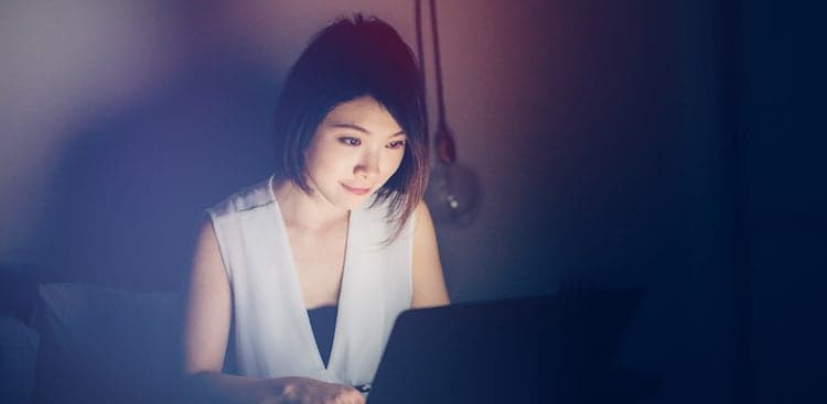 women on laptop at home