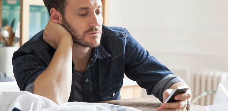 person bored on phone