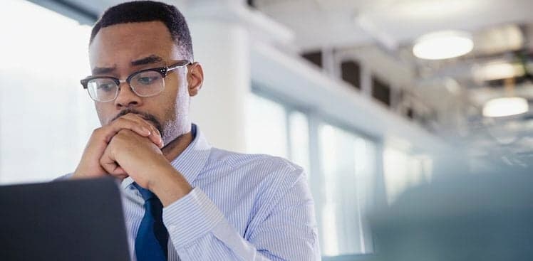 person looking at laptop
