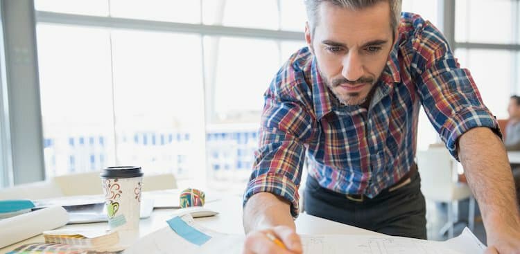 person drafting a plan