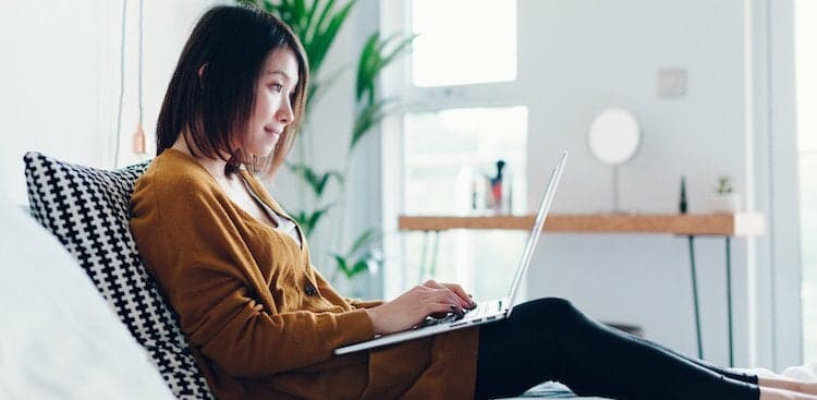 person at home on laptop
