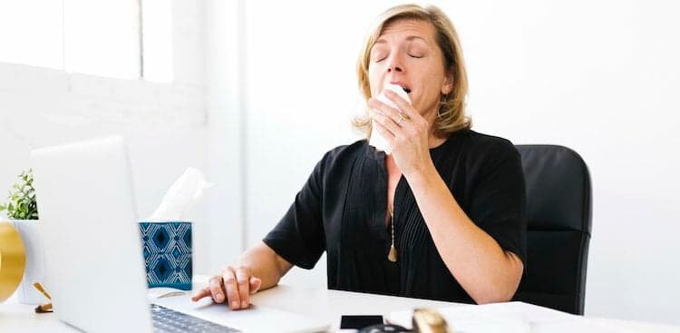 person sneezing