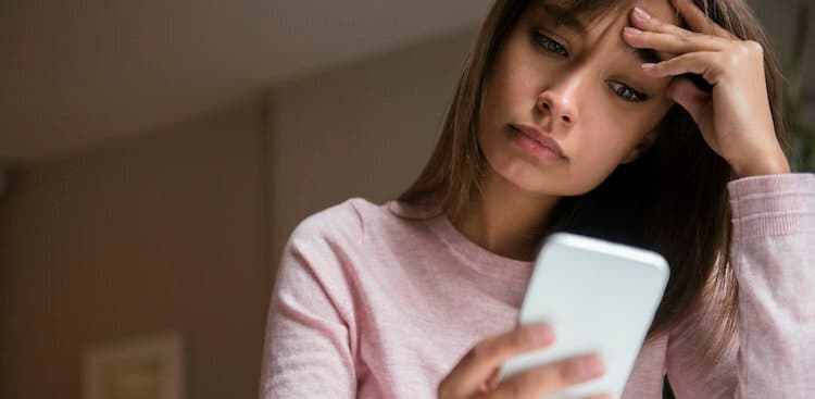 person stressed on phone