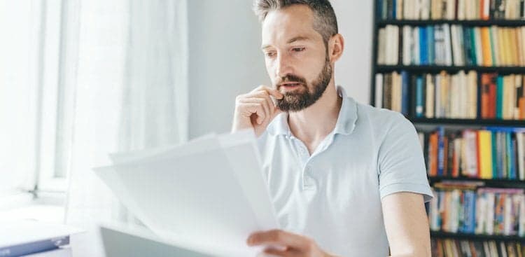 person looking at resume