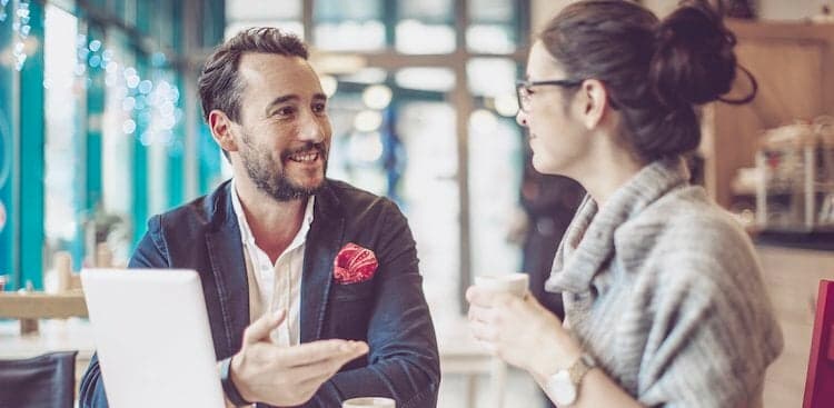 people talking over coffee