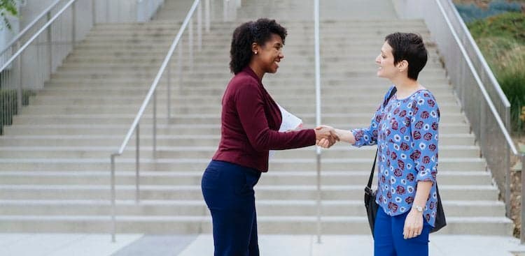 people shaking hands