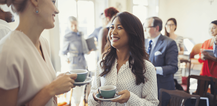 people talking at a networking event