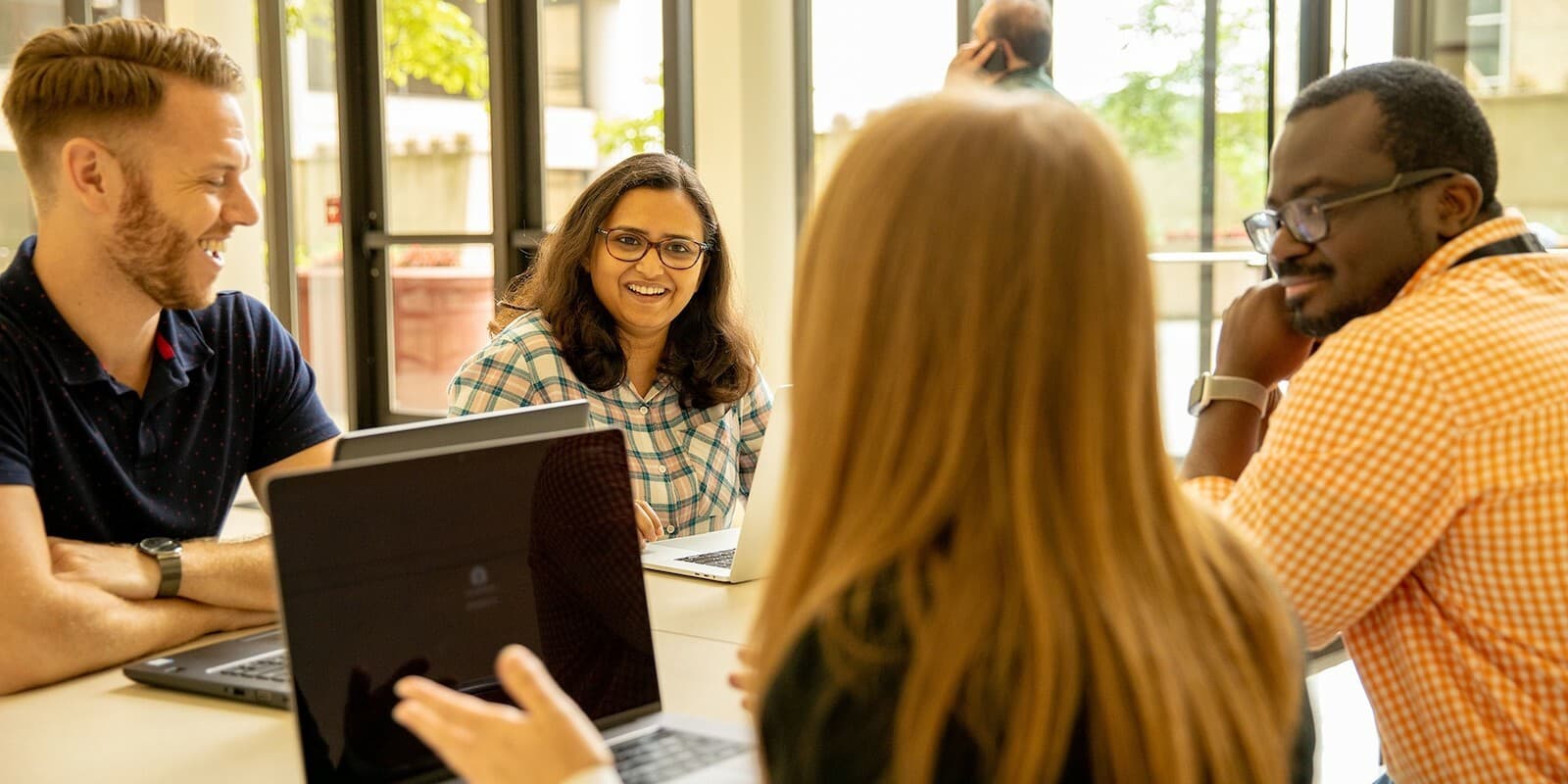Empoylees in a meeting at Kroger's Cincinnati, OH, office