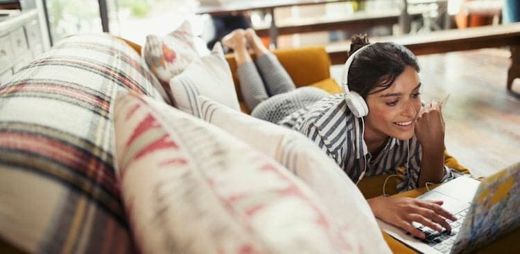 person on couch working