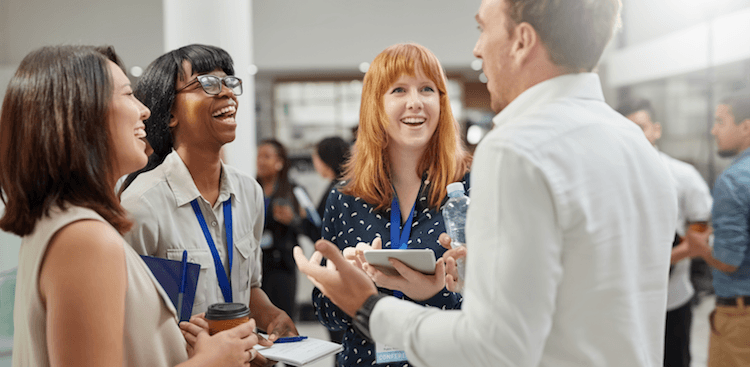 people talking at a networking event