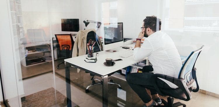 person alone at desk
