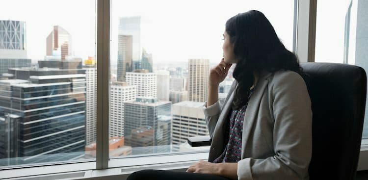 person thinking at desk