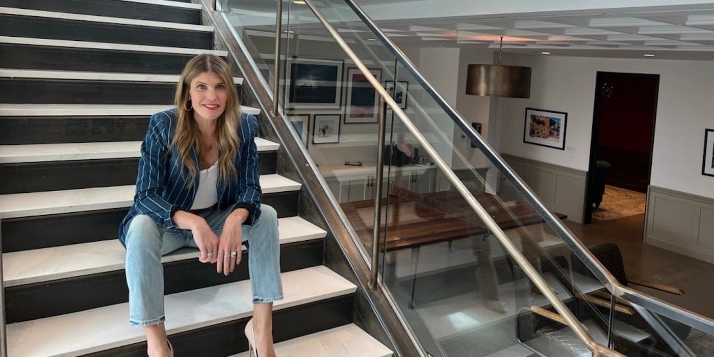 a person sitting on in a stairwell