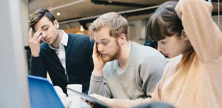 people stressed in a meeting