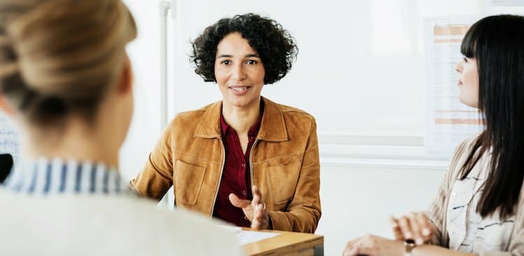 person talking to boss