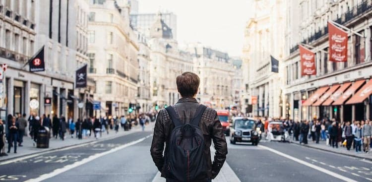 person walking down the street in London